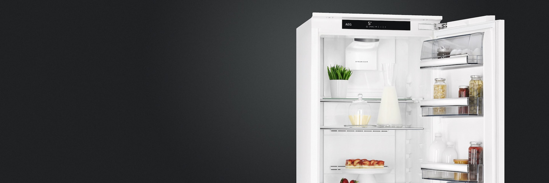 Open built-in refrigerator view displaying food
